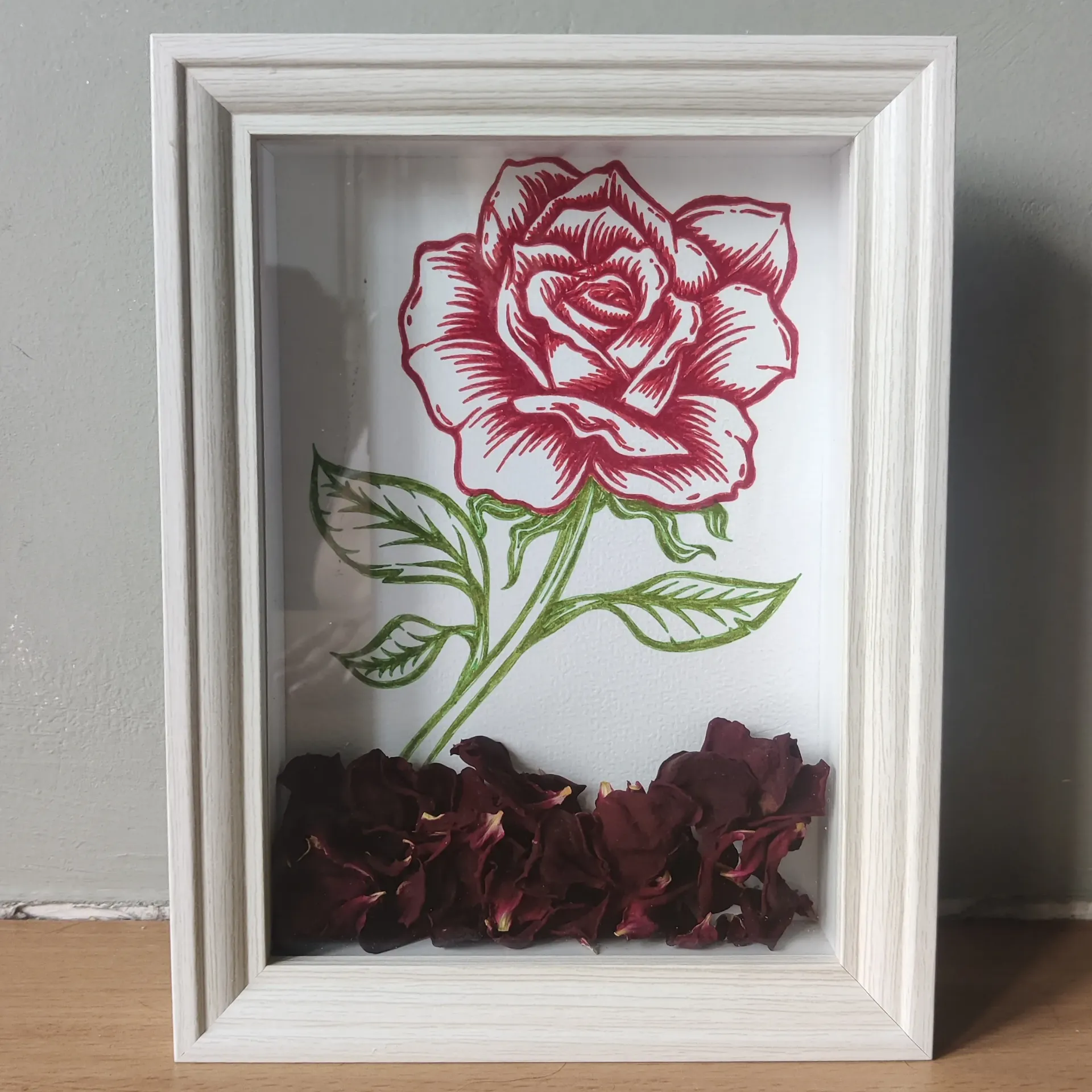 Cadre rose rouge séchée